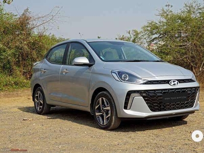 Buy New Hyundai Aura petrol cng car in low downpayment