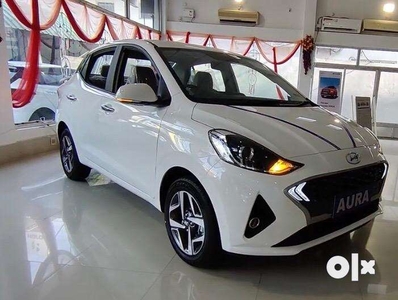 Buy New Hyundai Aura tourist car petrol cng at low downpayment