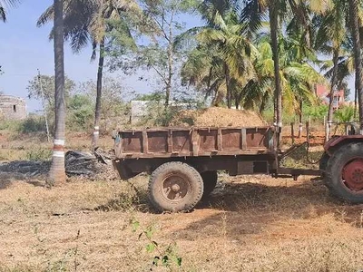 Good condition tractor with trolley for sale