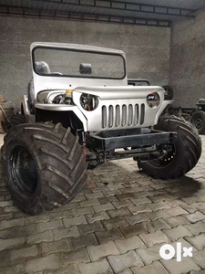 Monster tyre with open Modified Jeep ready by Happy Jeep Motor's book