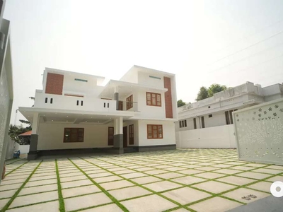 Aluva Town non flooded Area 15 cent 4350 sqft 5 bhk attached +theater