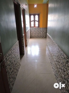 Marble in floor and tiles in wall
