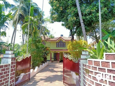 Land with house for sale in Thalasserry