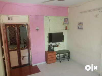 Non negotiable 1 bhk semi furnished flat for sale on main road
