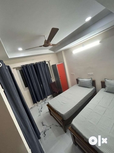 Flat sharing near amazon,waverock, 1 bed room in 2 bhk Fully furnished
