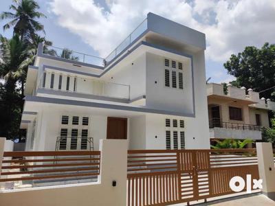 A SUPERB NEW 4BED ROOM 2075SQ FT 5.25CENT HOUSE IN KURIACHIRA,THRISSUR