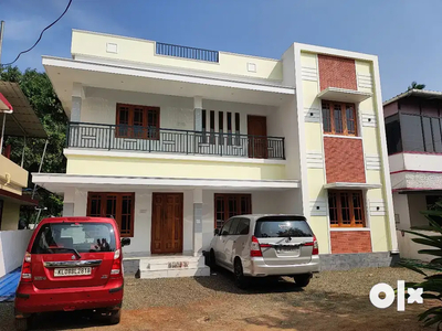 AN ELEGANT NEW 4BED ROOM 1720SQ FT HOUSE IN KOLAZHY,THRISSUR