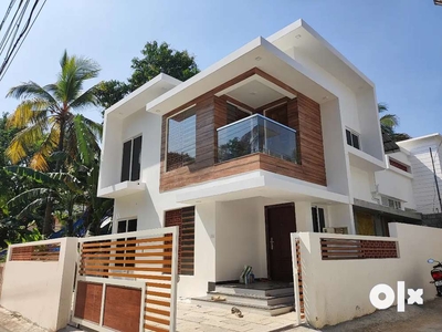 AN AMAZING NEW 3BED ROOM 1500SQ FT HOUSE IN KOORKENCHERY,THRISSUR