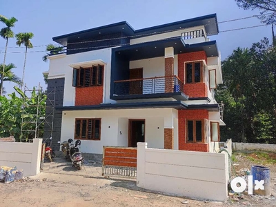 AN ELEGANT NEW 3BED ROOM 1900SQ FT 5CENT HOUSE IN NADATHARA,THRISSUR