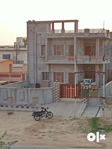 New house in front of State Highway