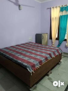 One room with attached bathroom and semi furnished