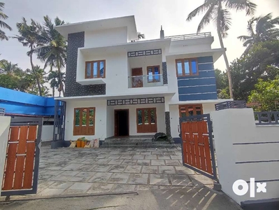 AN AMAZING NEW 4BED ROOM 2100SQ FT HOUSE IN KURIACHIRA,THRISSUR
