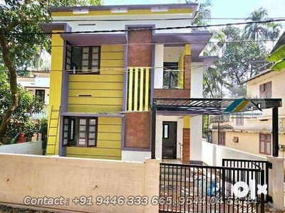 A two-story home with 3 attached bedrooms, Kozhikkode Vellimadukunnu