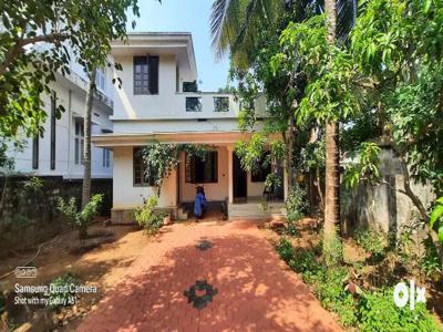 14.4 cent n 10 year old house for sale ,only land price in Kuriachira