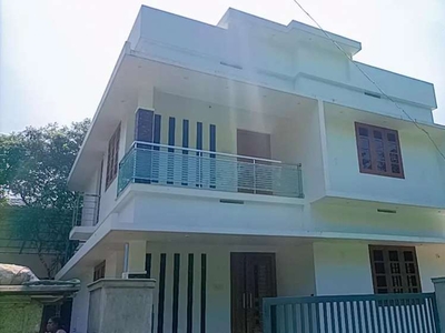 A STRIKING NEW 3BED ROOM 1400SQ FT HOUSE IN KOLAZHY, THRISSUR