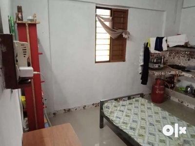 Semifurnished single room, kitchen space, attached bathroom for rent