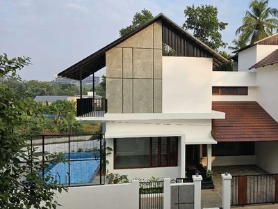 Kuzhivelippady 9cent land with 3500sqft 4Bhk luxury House with pool